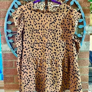Angashion animal print top size XL
